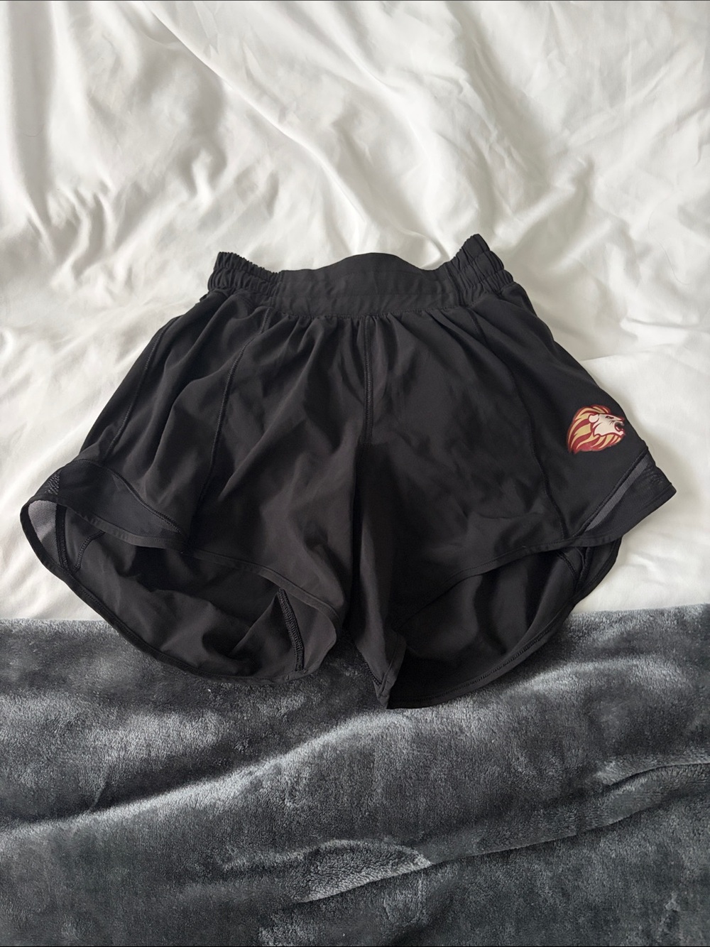 lululemon athletica Black hotty hot 4 inch Shorts with Lion head